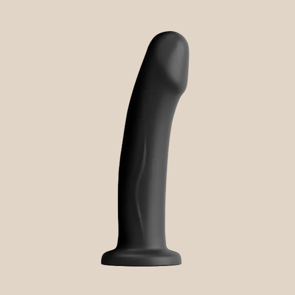 Black silicone dildo with curved design and suction base on neutral background