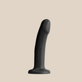 Black silicone curved dildo with a flared suction base on a plain background