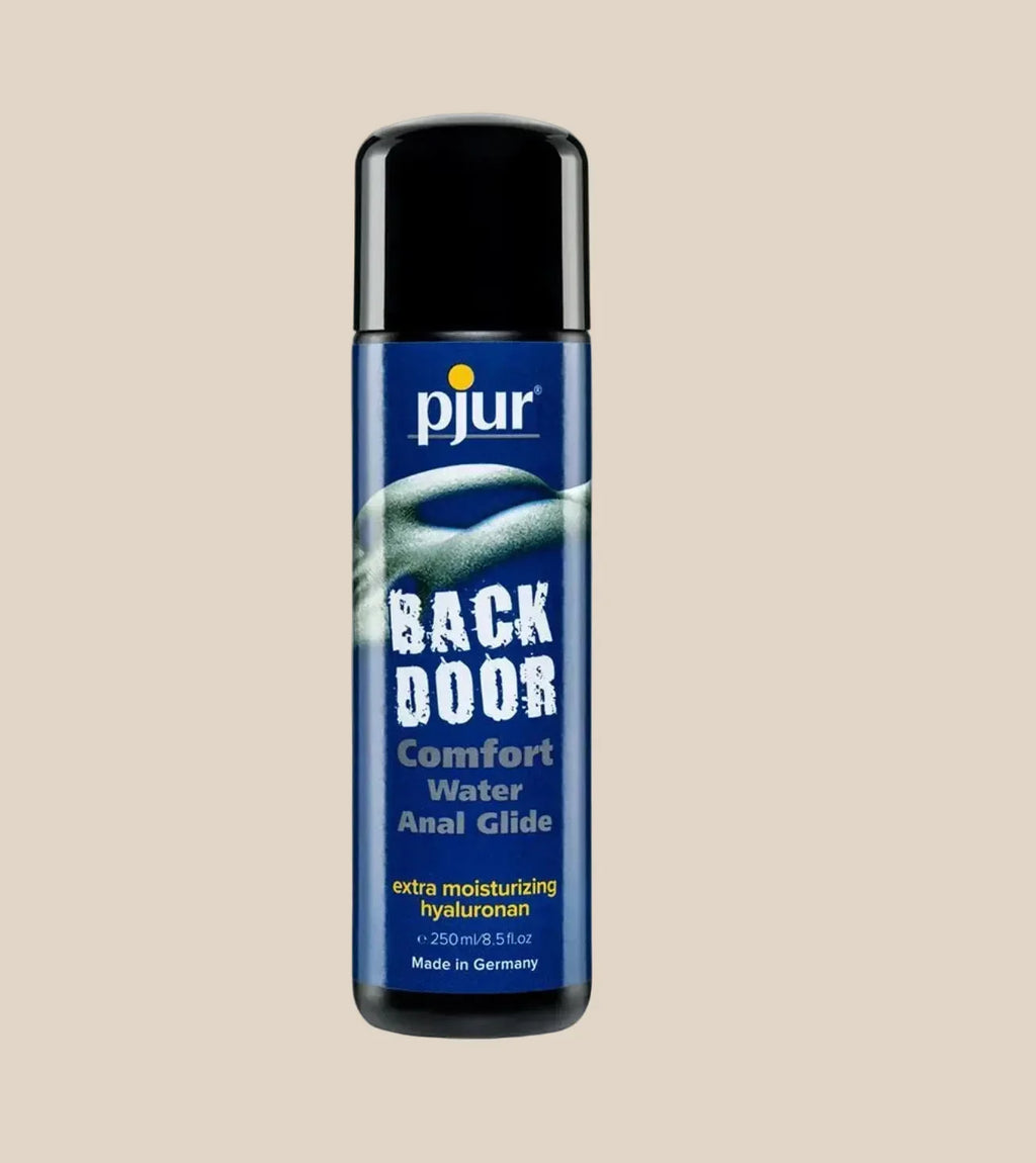 Pjur Back Door Comfort Water Anal Glide lubricant bottle, extra moisturizing, 250ml, on beige background
