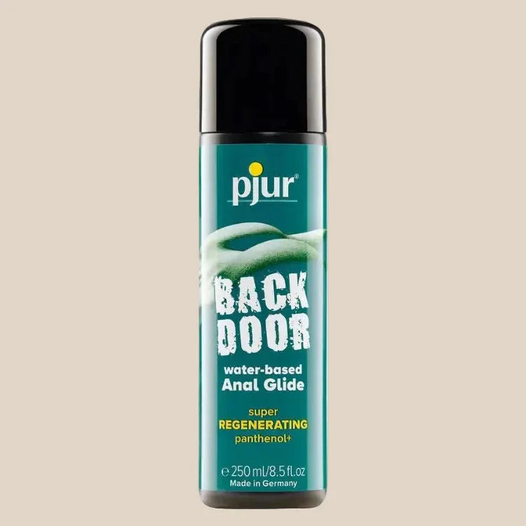 Pjur Back Door water-based anal glide lubricant bottle, 250ml size with black cap, on beige background.