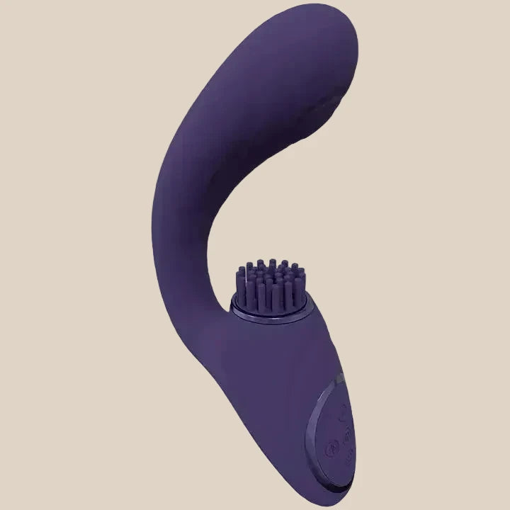 Purple silicone curved vibrator with brush stimulator and control buttons