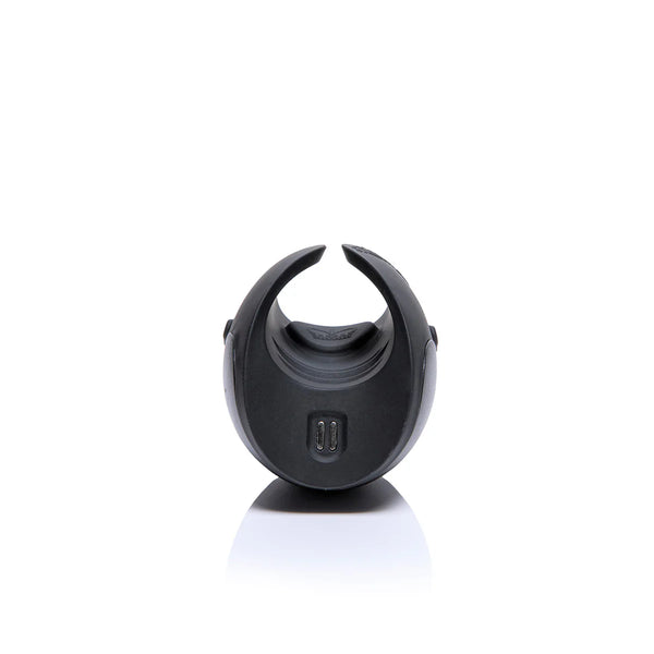 Black silicone vibrating ring with open curved design, photographed on a white background
