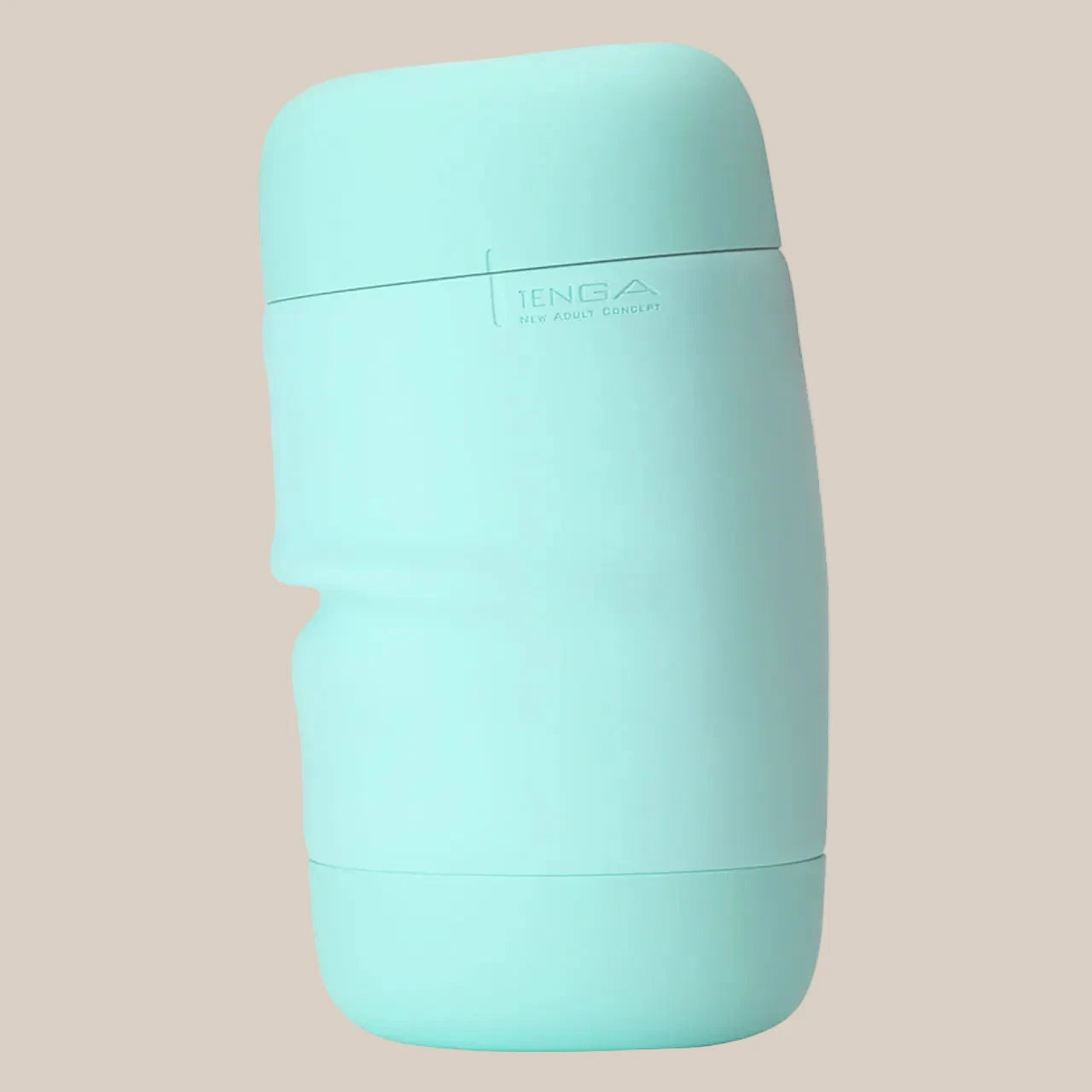 Mint green textured adult toy in discreet casing on neutral background