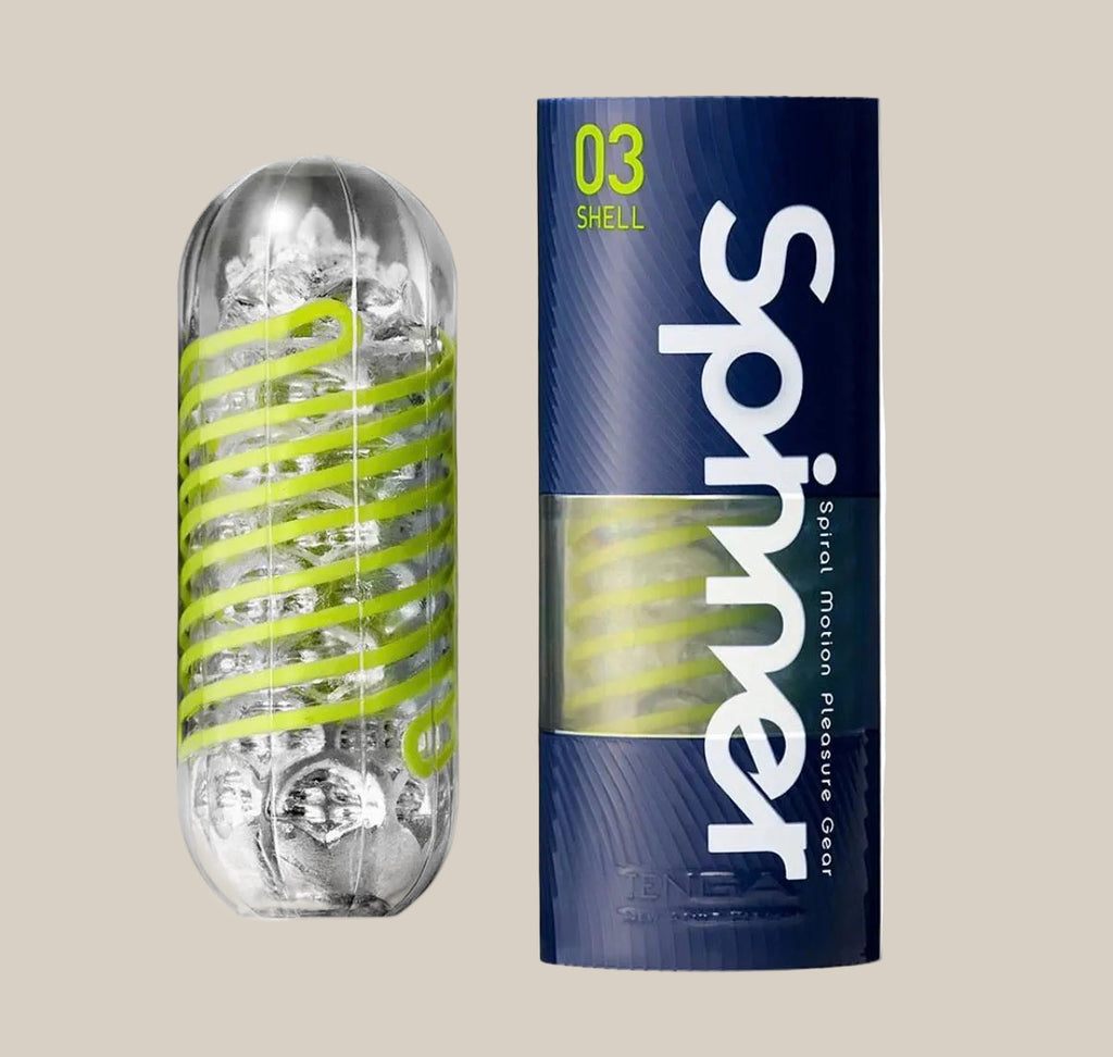 Textured transparent male stroker with spiral design and blue cylindrical packaging