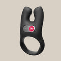 Black silicone vibrating ring with dual prongs and button control, intimate wellness product