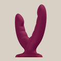 Dual-ended burgundy silicone adult pleasure toy with textured design on neutral background