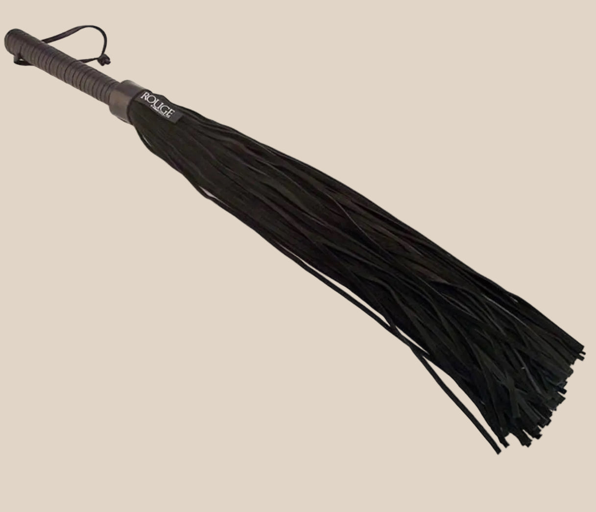 Black leather flogger with wrapped handle and wrist loop on neutral background