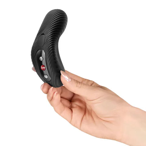 Hand holding a black, curved textured vibrator with control buttons, body-safe adult toy
