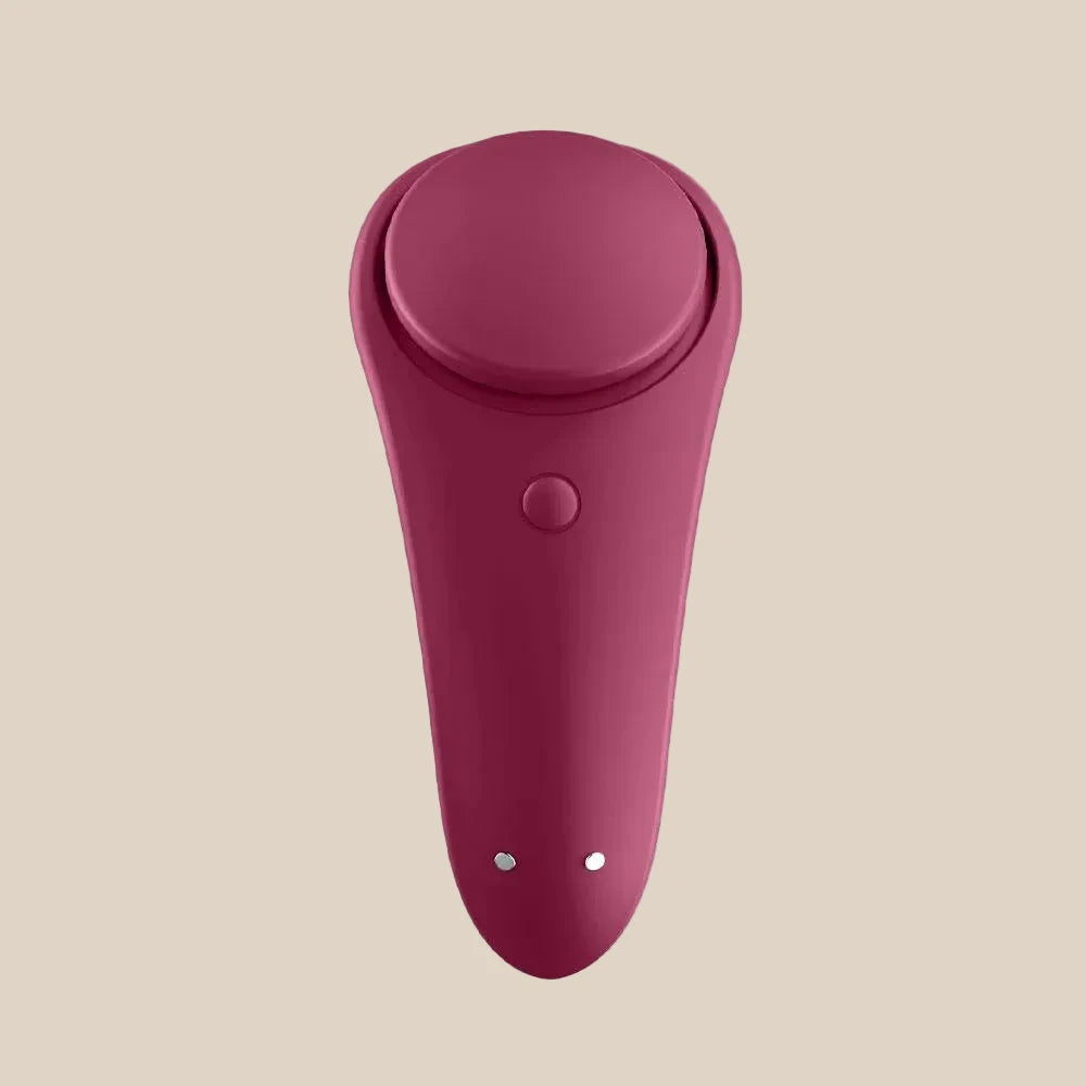 Burgundy silicone rechargeable personal massager with button, isolated on white background