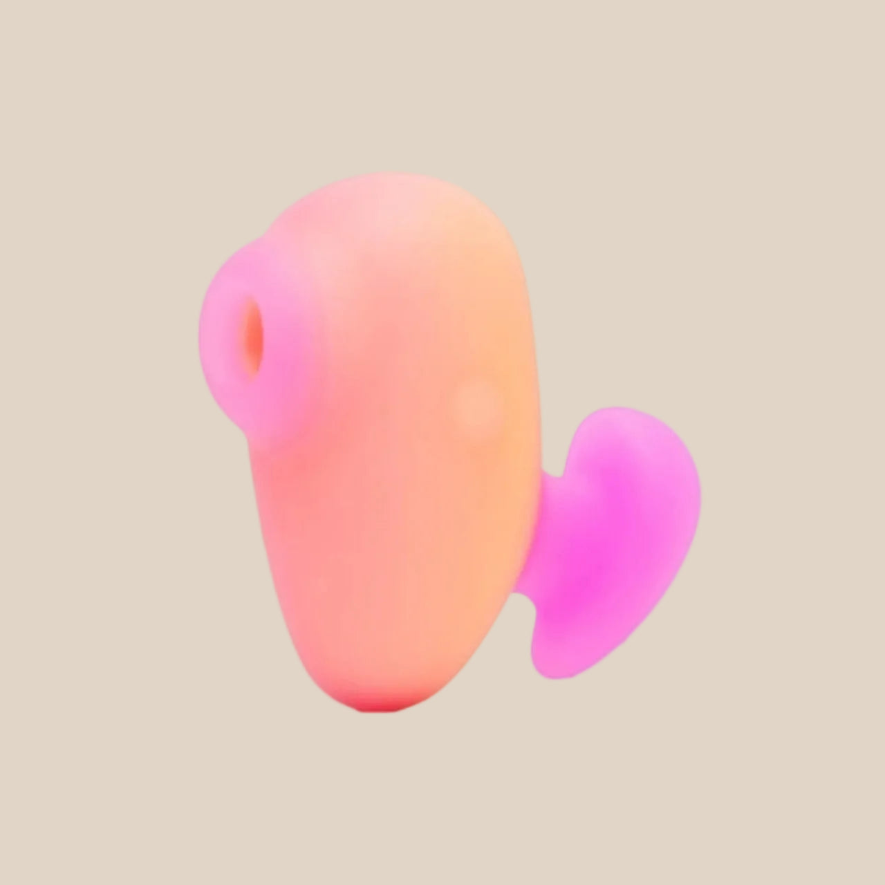 Pink and orange silicone suction stimulator for intimate pleasure, isolated on white background