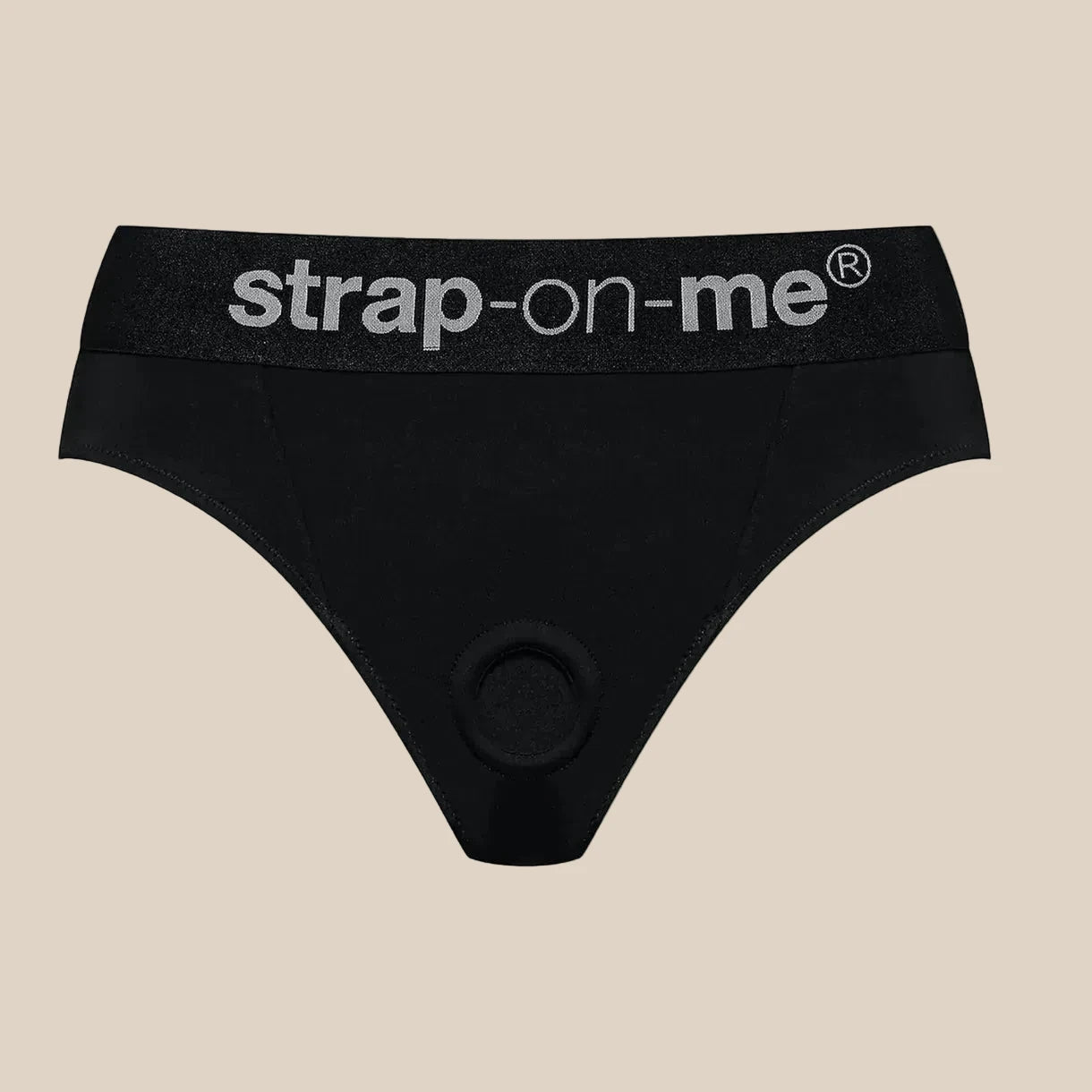 Black strap-on harness underwear with visible waistband text on plain background.