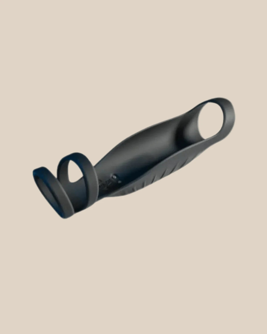 Black silicone vibrating couple's ring with ergonomic design on a neutral background