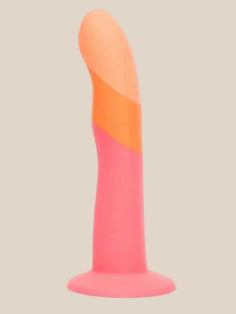 Colorful silicone adult toy with curved tip and suction cup base on light background