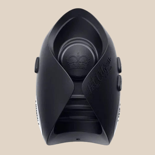 Black textured silicone male pleasure device with ergonomically curved design
