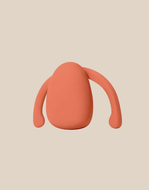 Dame Eva 2 hands-free vibrator showing the flexible wings and compact ergonomic design.