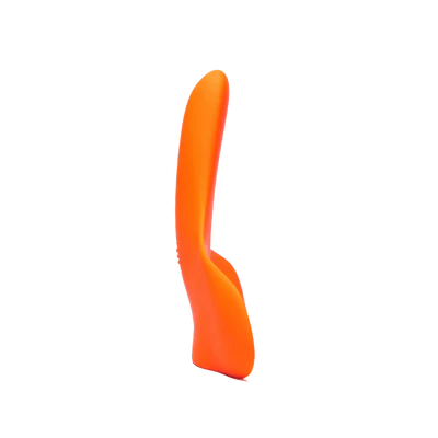Orange silicone curved adult pleasure toy on white background