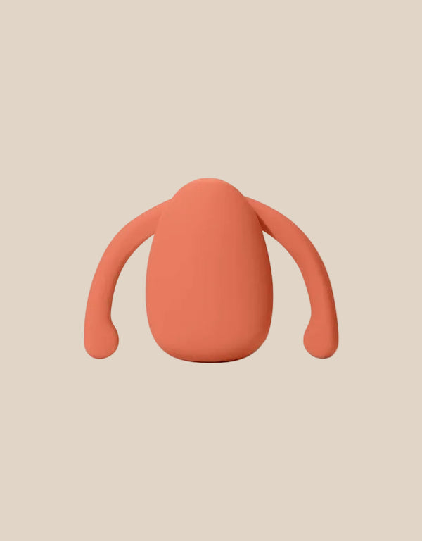 Dame Eva 2 hands-free clitoral vibrator in Papaya orange at Noirette.