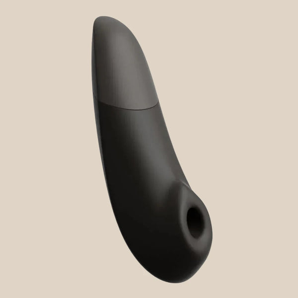 Womanizer Enhance in Black clitoral suction and vibration toy at Noirette.