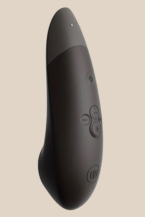 Side profile of the Black Womanizer Enhance showing the sleek, curved design.