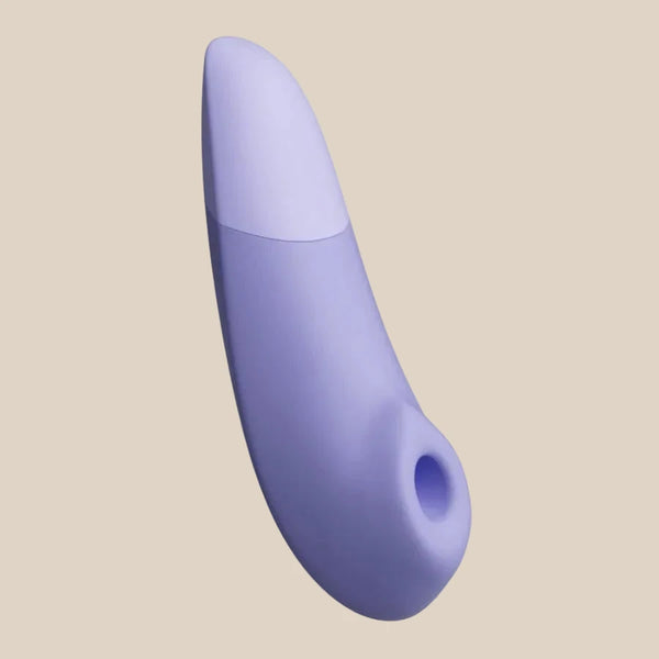 Luxury Lilac Womanizer Enhance dual-motor pleasure air stimulator at Noirette.