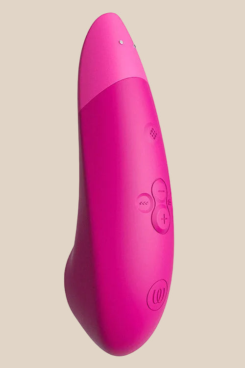 Close-up of the easy-to-use interface on the Vibrant Pink Womanizer Enhance.