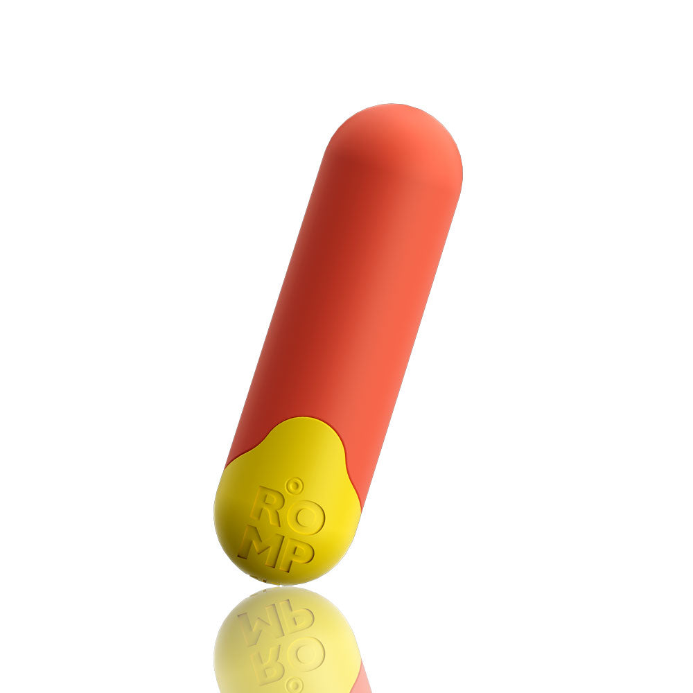 Rechargeable bullet vibrator in orange and yellow, body-safe silicone, isolated on white
