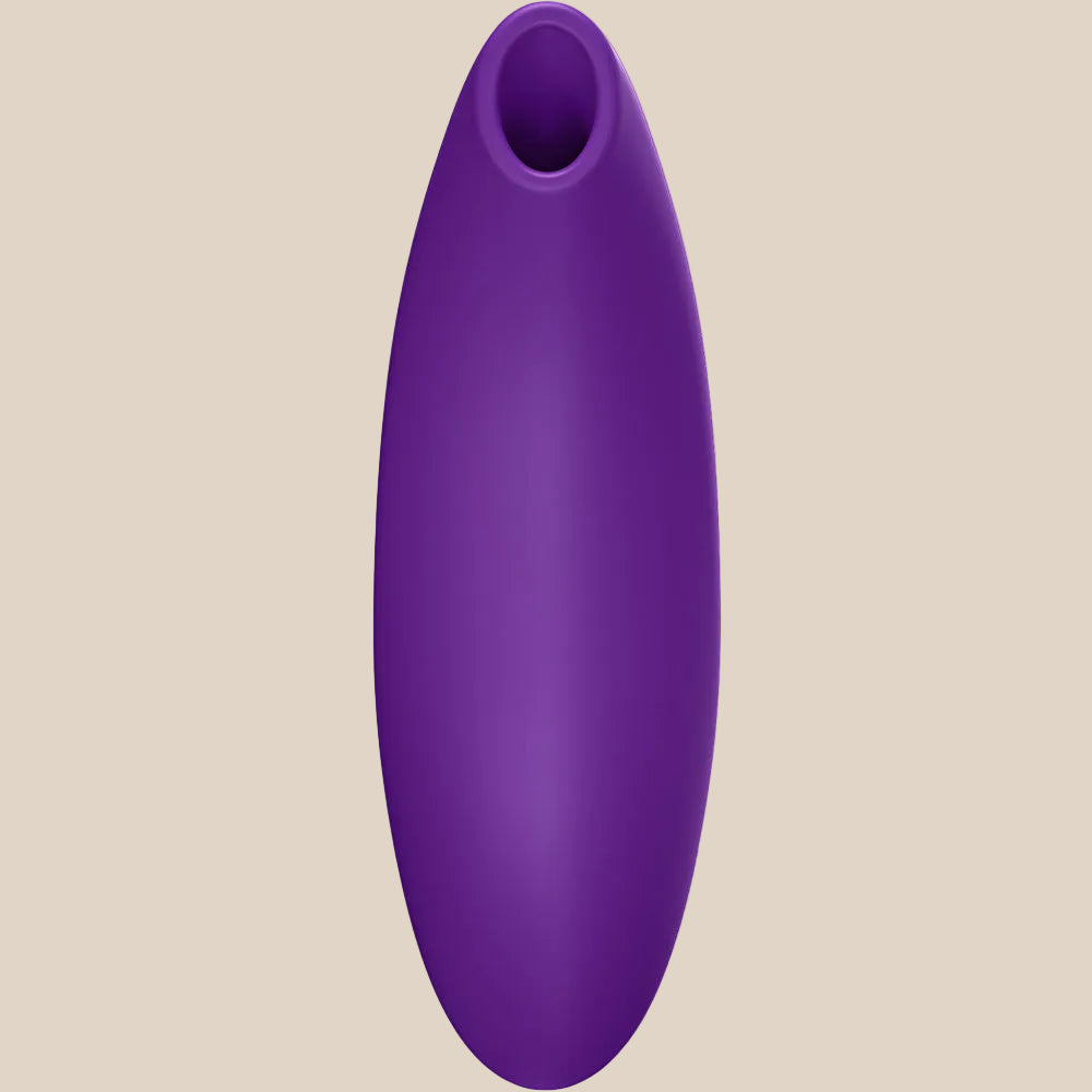 Purple silicone air pulse stimulator for adult pleasure, oval shape, front view