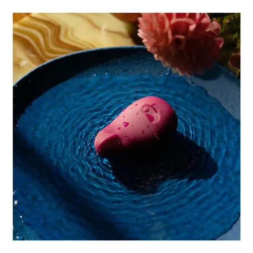 Fully submersible Plum Dame Pom vibrator for aquatic intimacy.