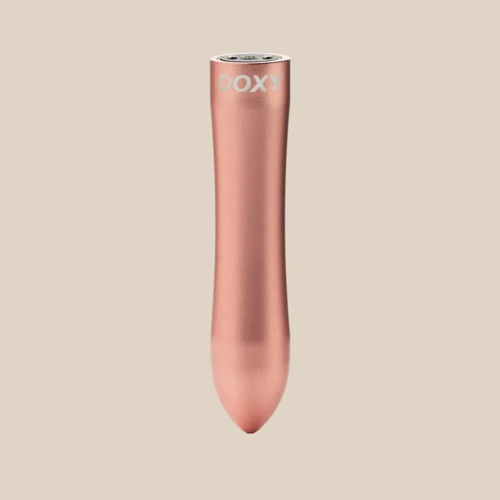 Doxy Bullet rechargeable pocket vibrator in elegant rose gold anodised aluminium on Noirette