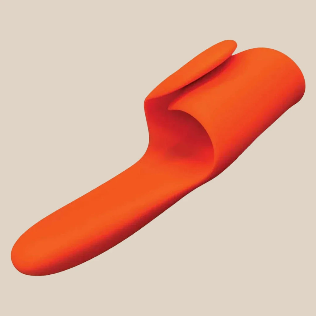Orange flexible silicone finger sleeve adult toy on white background