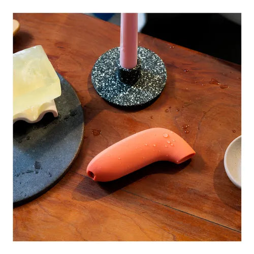 A Papaya Dame Aer styled in a warm, modern home aesthetic by Noirette.