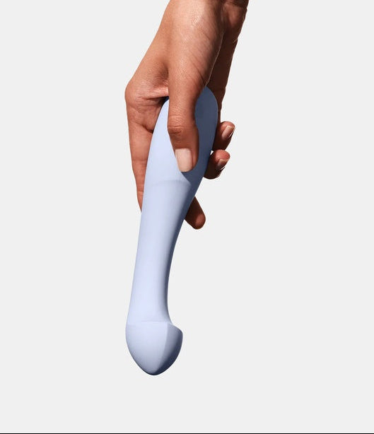 Handheld view of the Ice Blue Dame Arc at Noirette showing the ergonomic curve.