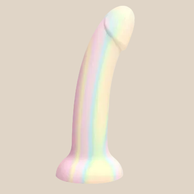 Rainbow pastel silicone dildo with curved shaft and flared base on beige background