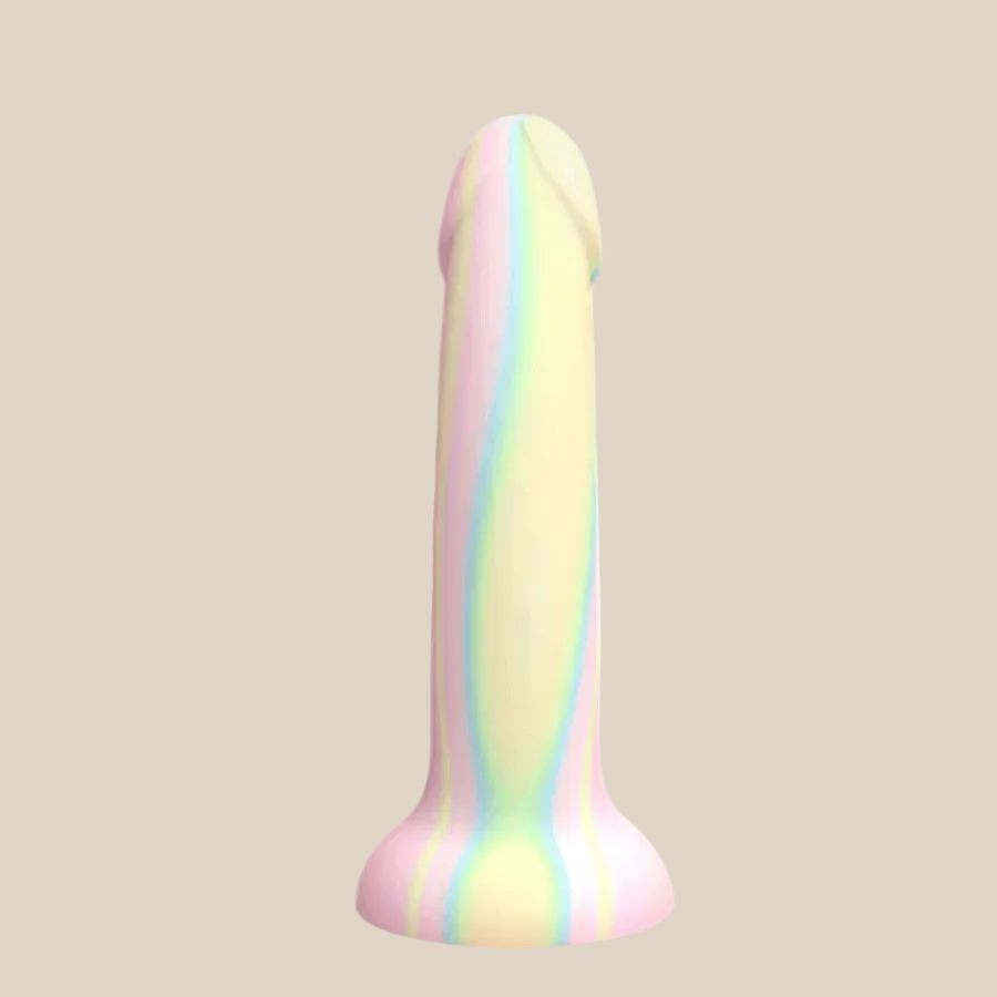 Pastel rainbow silicone dildo with a flared base, body-safe adult pleasure product